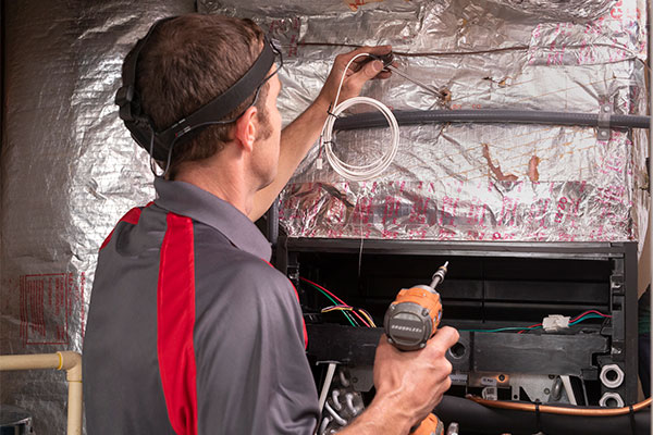 Using a duct sensor to check on heating system