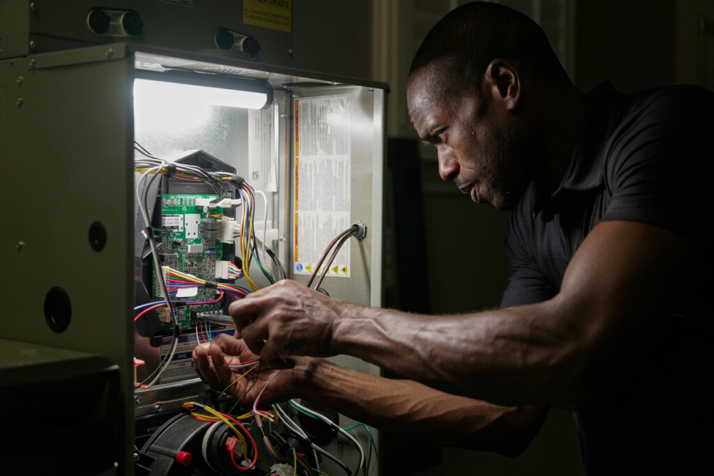 Trane dealer repairing a unit